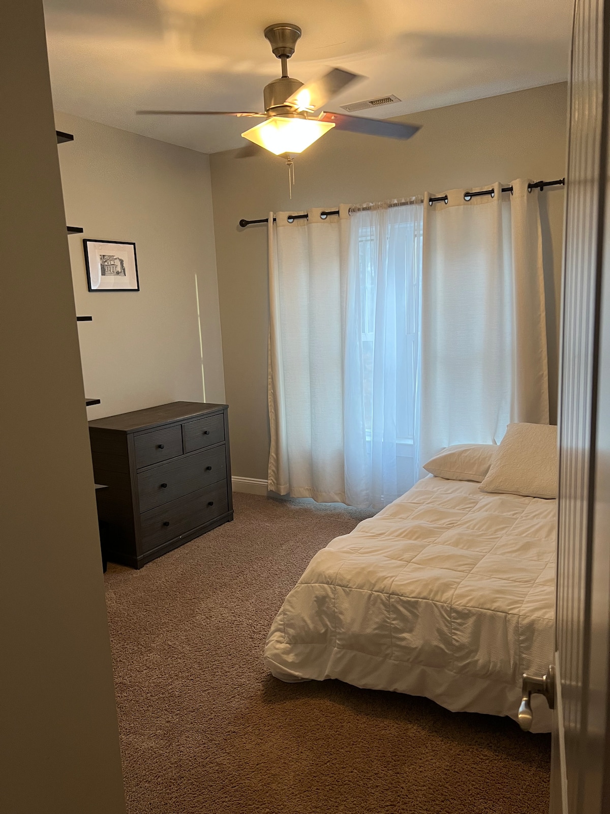 Second guest room; full size bed, closet, ceiling fan, dresser can convert into a changing table if needed. 