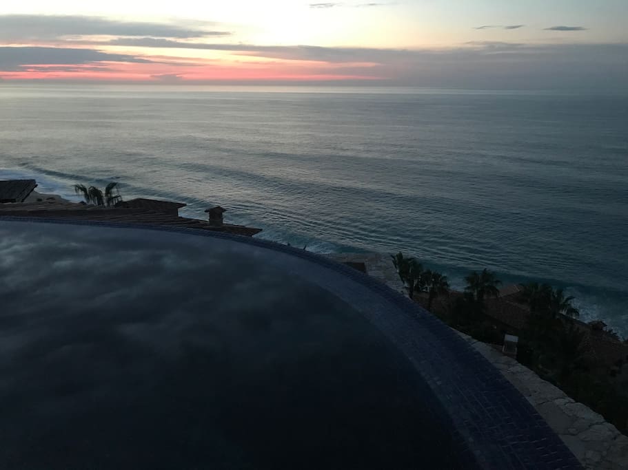 View from infinity pool at dusk