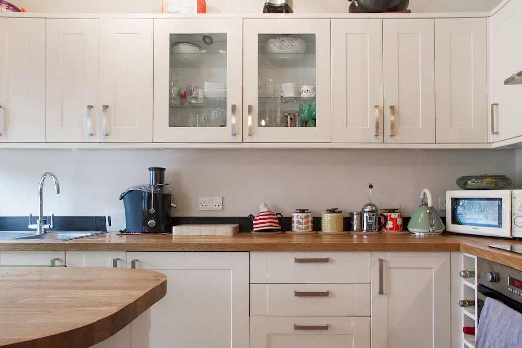 Fully stocked and equipped kitchen with microwave, washer / dryer and dishwasher.