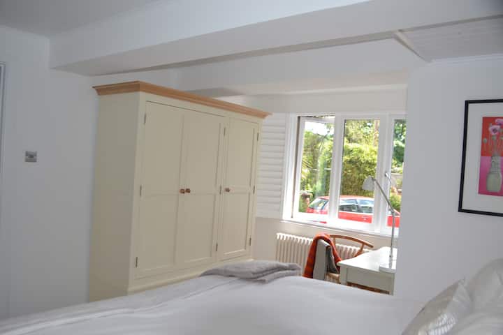 Bedroom with dressing table and wardrobe