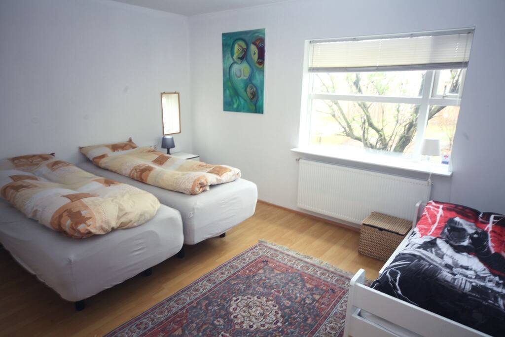 Large master bedroom with two large singles, can be fitted with a king size sheet. Also a childs bed that can be fitted with a gate.