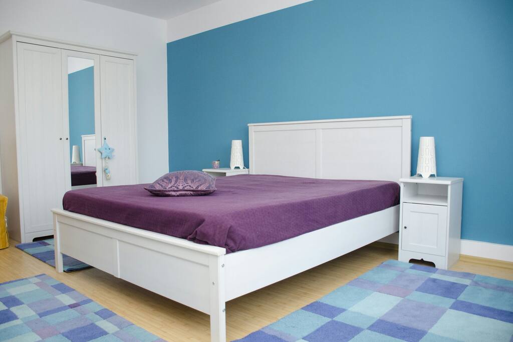 Master piece bedroom. King-sized bed, dressing and different kind of storage.