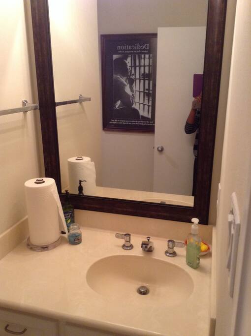Guest bathroom on second floor with full shower and tub