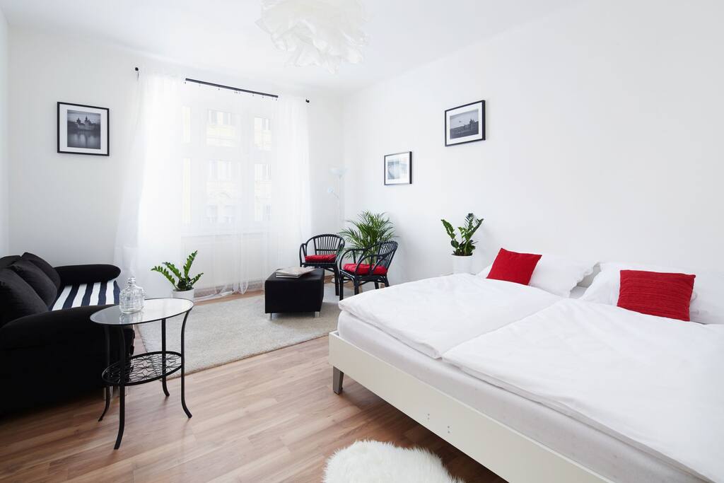 This is the bigger bedroom with a double bed and a folding sofa.