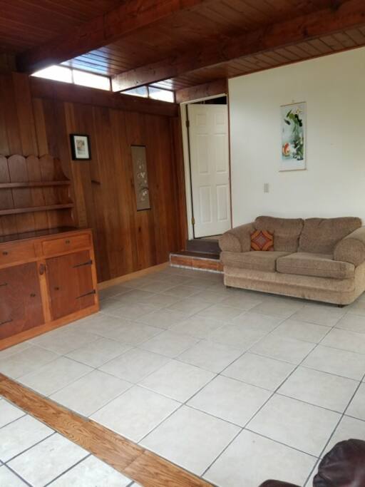Private living room and door to upstairs guest bedroom