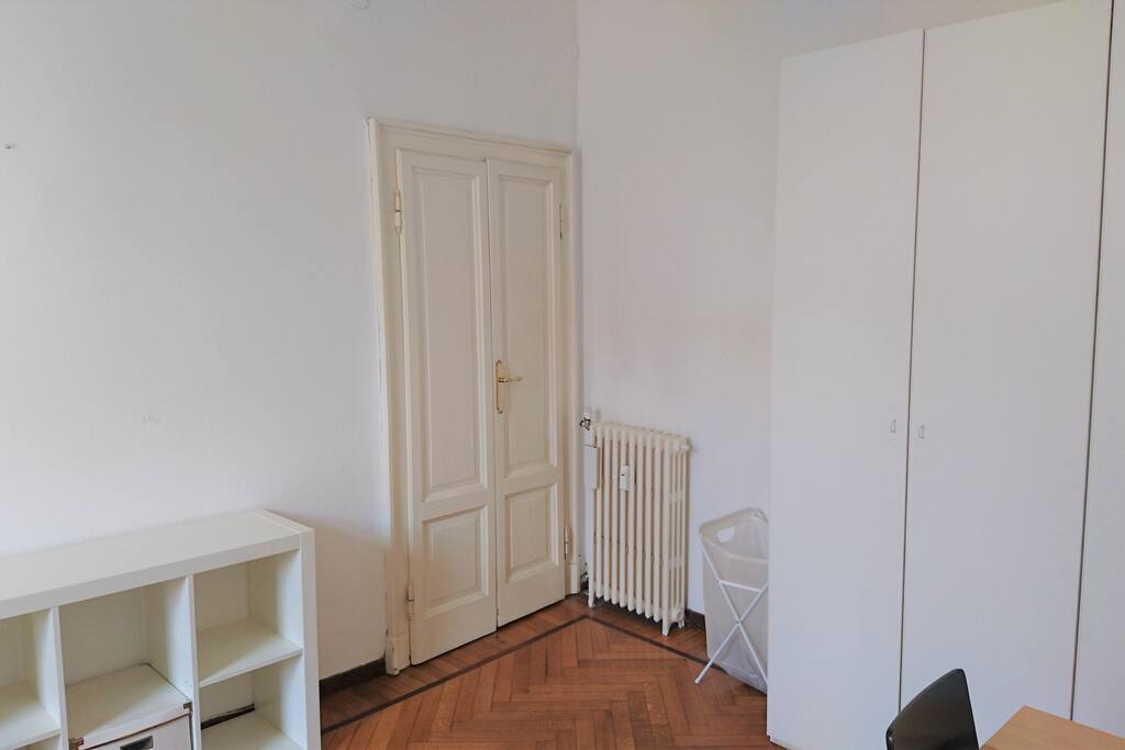 Private bedroom view 3. The laundry basket and the usage of the heater will be at your disposal.