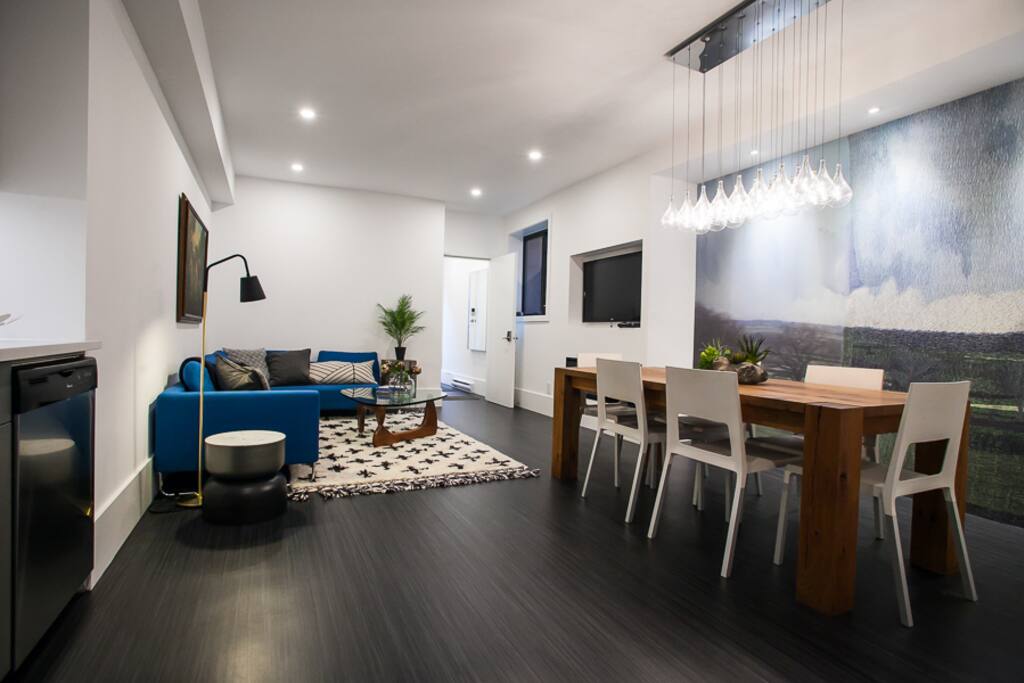 Looking at the living room from the entrance way. Designer touches throughout the flat.