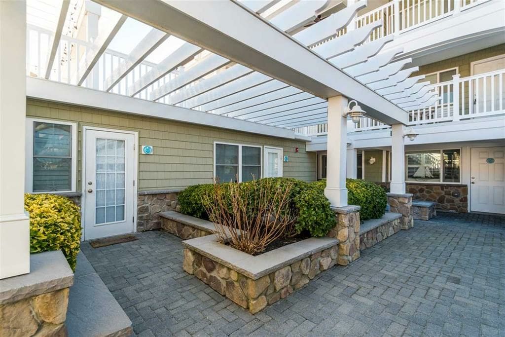 Front porch, includes a table and two chairs