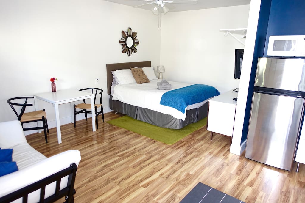 Clean, open space inside the studio apartment.