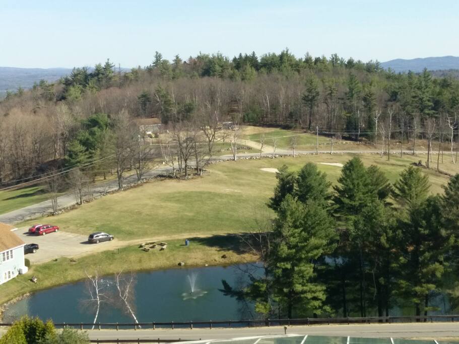Tower view of pond basketball, golf, soccer (seasonal activities).