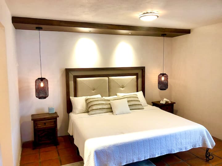 Master bedroom with King size bed.