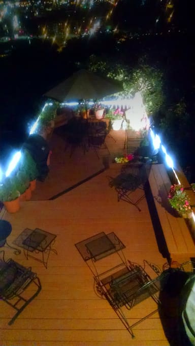 Our deck, usually available at night, is lovely. Note the fountain and the rope lights. Enjoy!