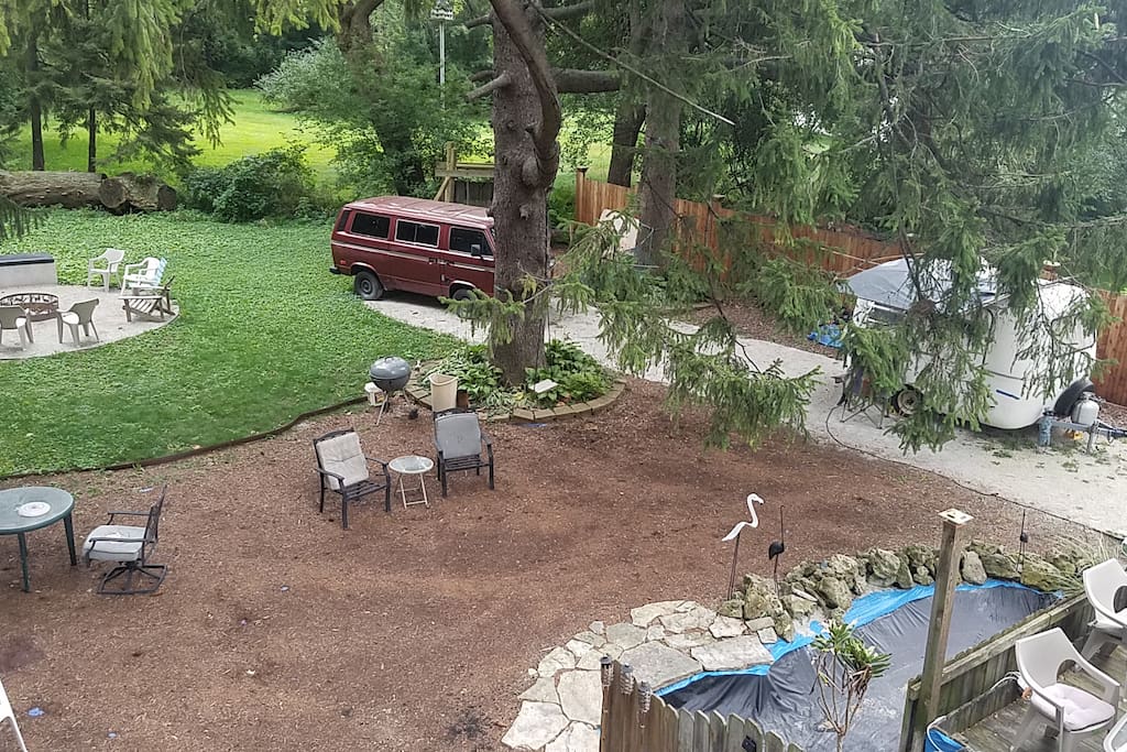 Enjoy the quiet splendor of our lush backyard from multiple vantage points--the deck, the pond w/waterfall, or one of three fire pits. Relax in the hammock or swing.