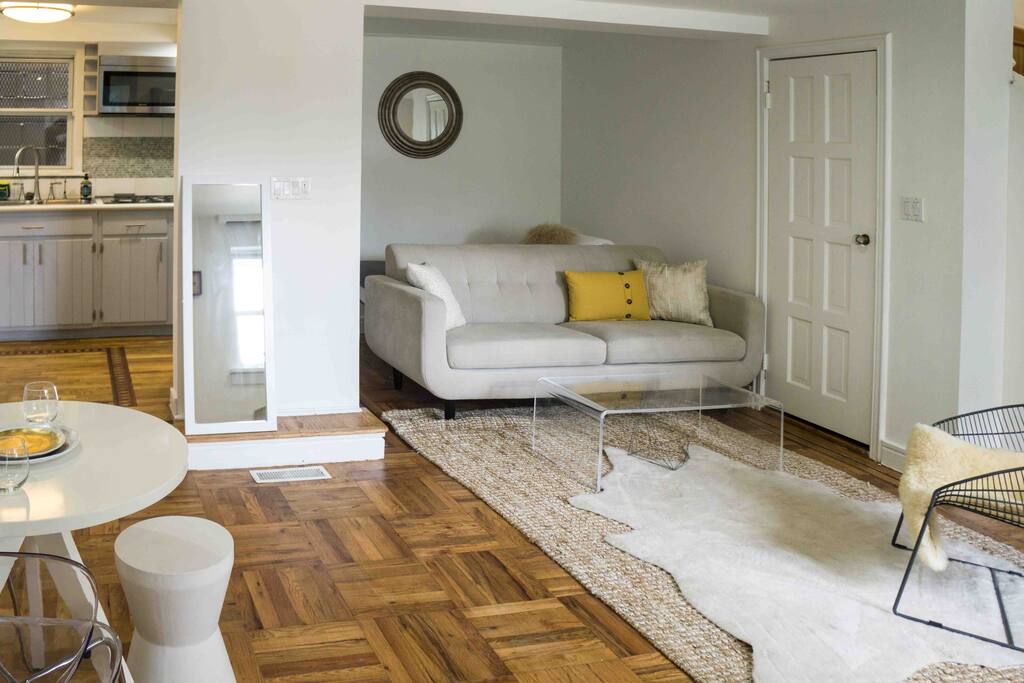 living room and a twin bed in the den area.