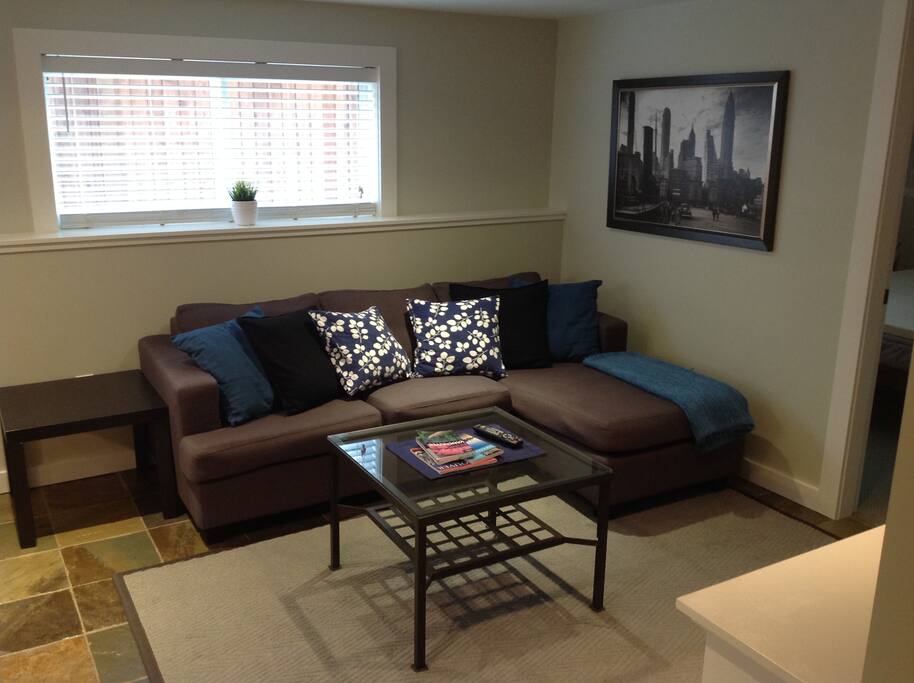 Living room with bright windows.