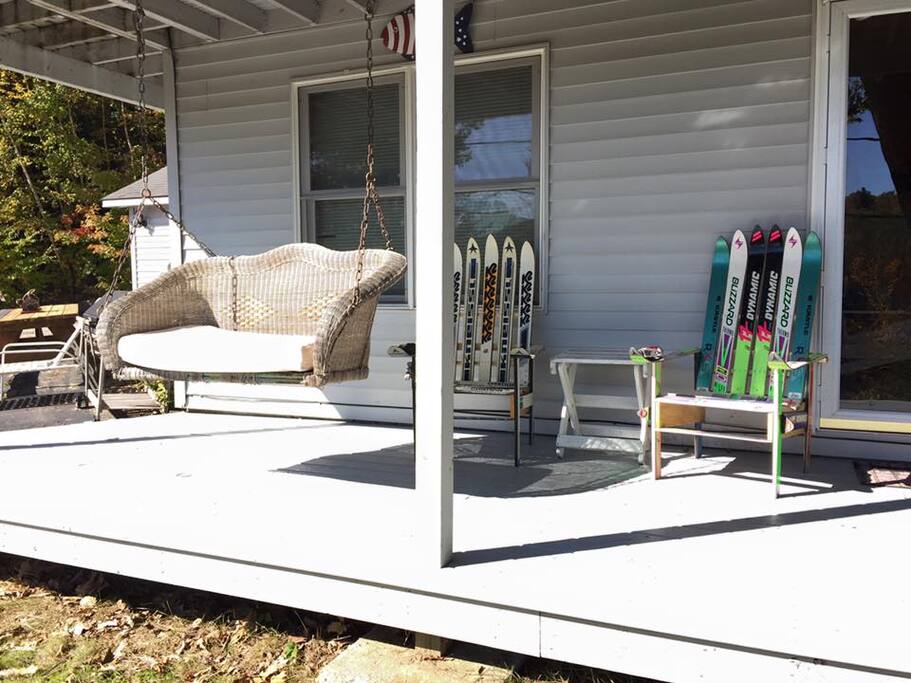bright sunny morning seating on our front porch overlooking pond