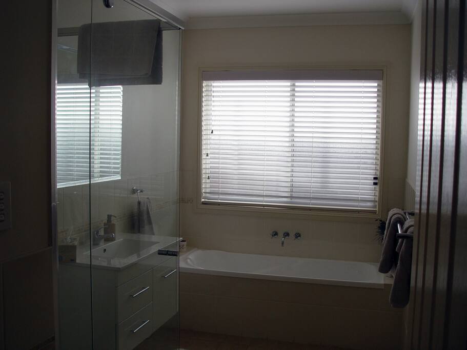 Private adjacent bathroom. Separate private toilet.