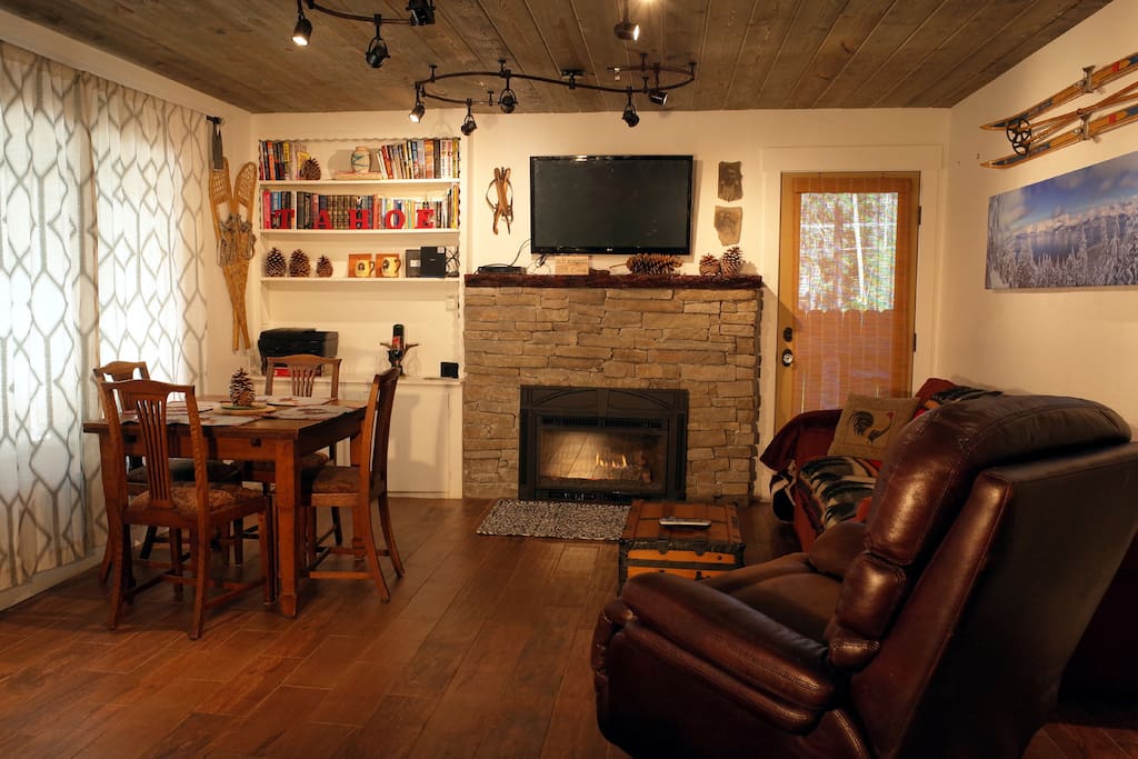 The main room of the house, showcasing cozy rustic touches.