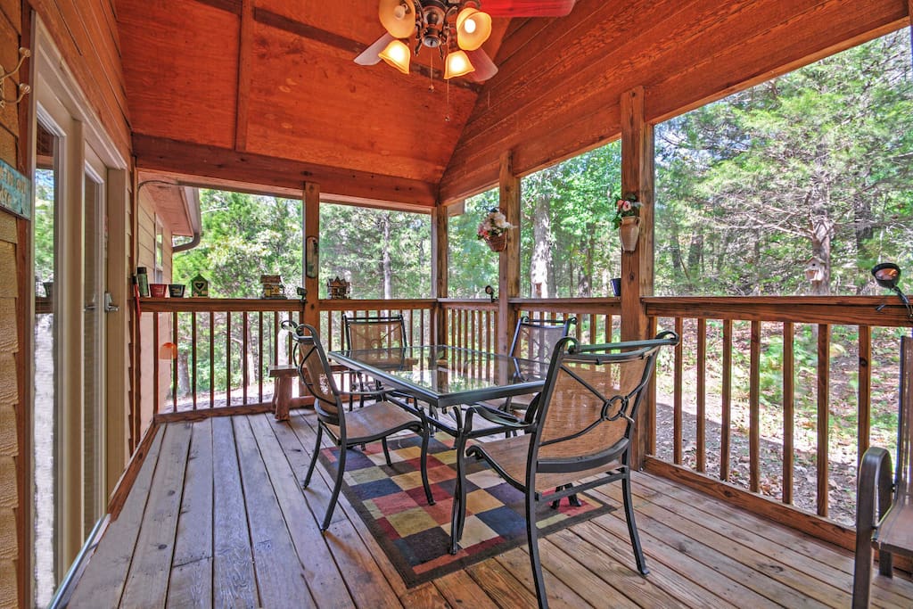 Take in the scenery while playing a board game on the screened-in porch.