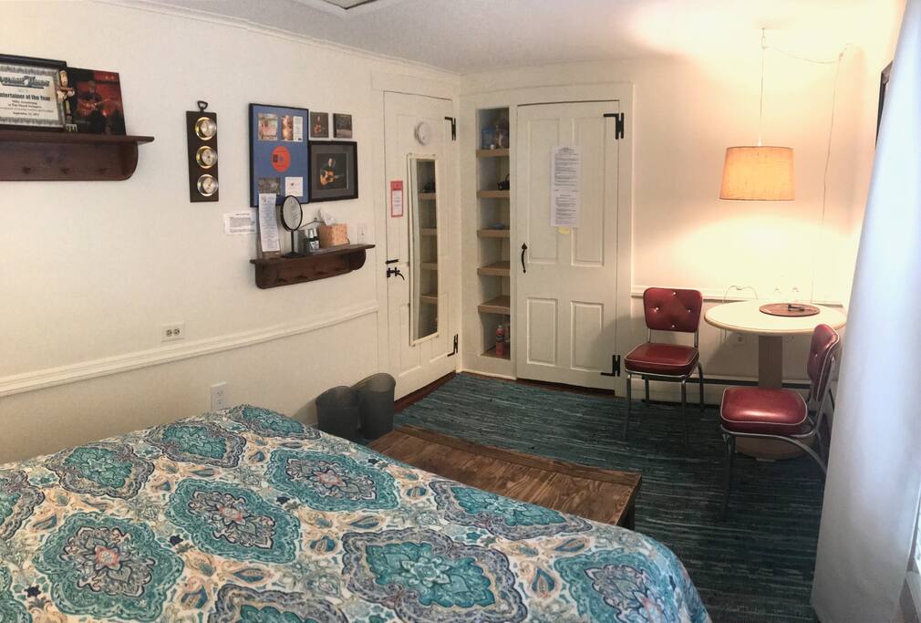 Fluffy towels and a hair dryer are provided in room.