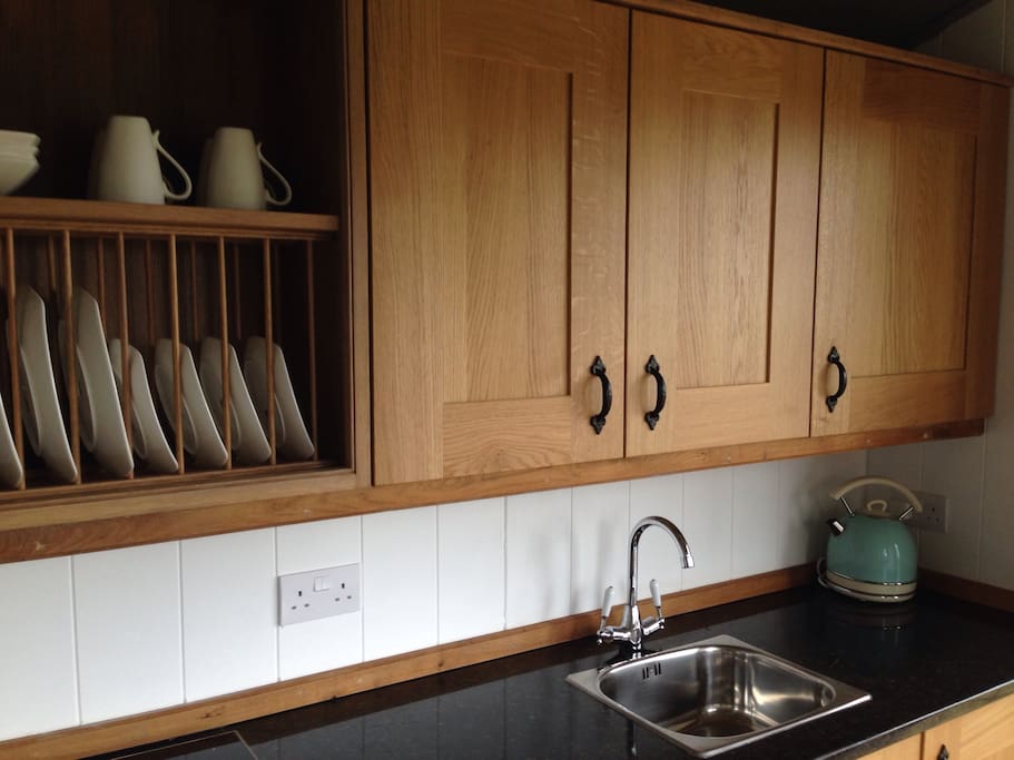 The hut comes with a fully functional kitchen including hot and cold running water, kettle, toaster, electric hob, combination microwave oven/grill and a fridge