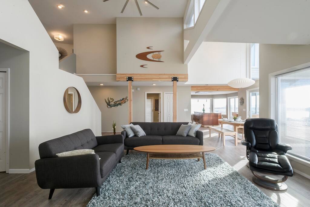Main living area is very open with a bit of mid century modern flare