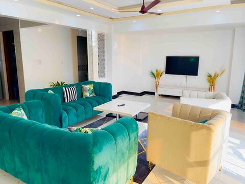 A lush Four bedroom Condo with a pool