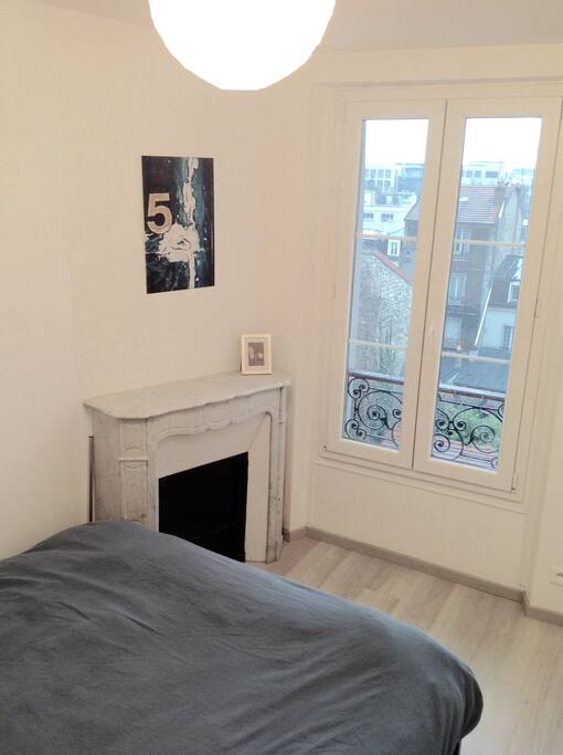 Chambre avec cheminée au calme vu sur cour