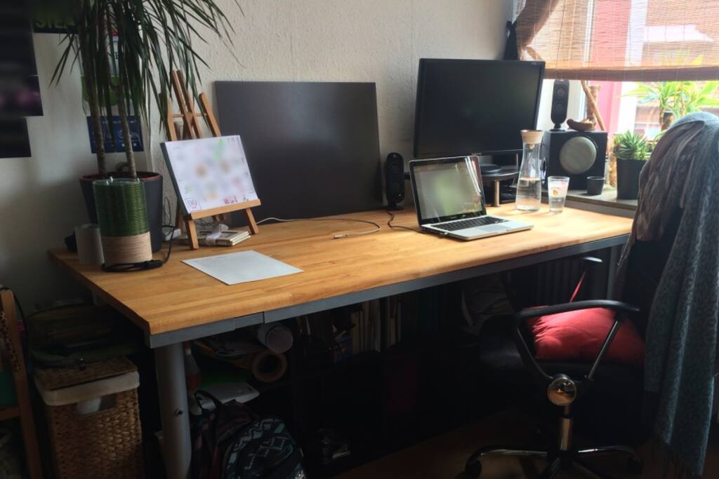 A desk with lots of additional space underneath.