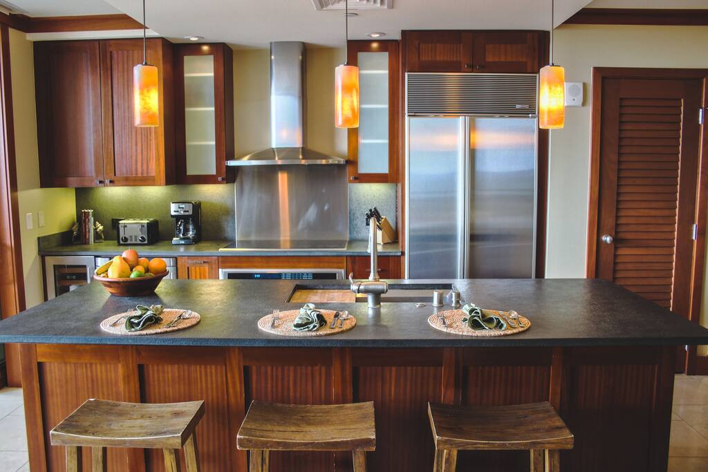 The kitchen features designer appliances to bring out the iron chef in you!