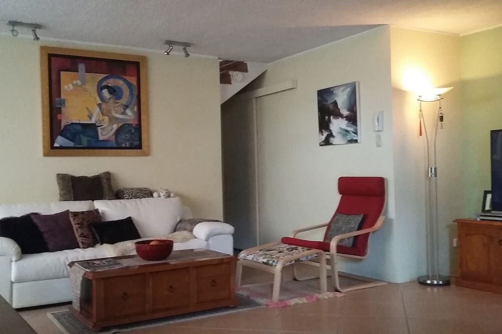 Comfy lounge room, 55" TV and DVDs