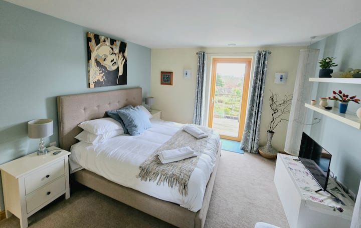 Beautiful ground-floor master suite with dressing room and ensuite bathroom ideal for those with mobility issues or the elderly.