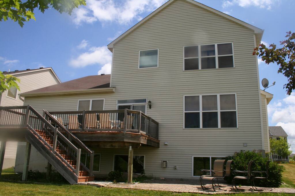Back of house with rear deck
