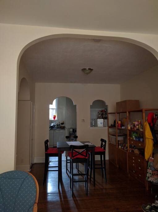 Dining area + kitchen (far-end) and bathroom
