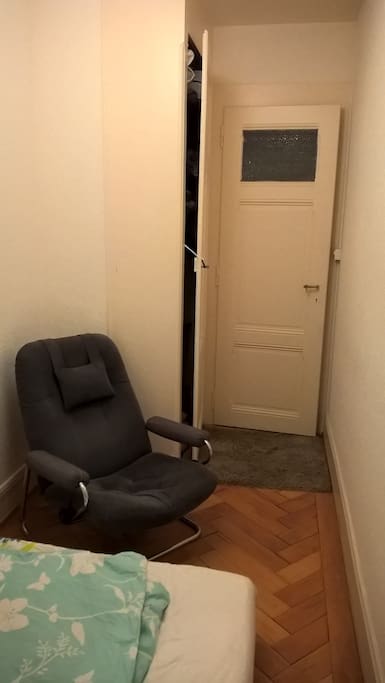 Room has a cosy bed, an armchair and a build-in cupbord (to store your clothes, etc.)