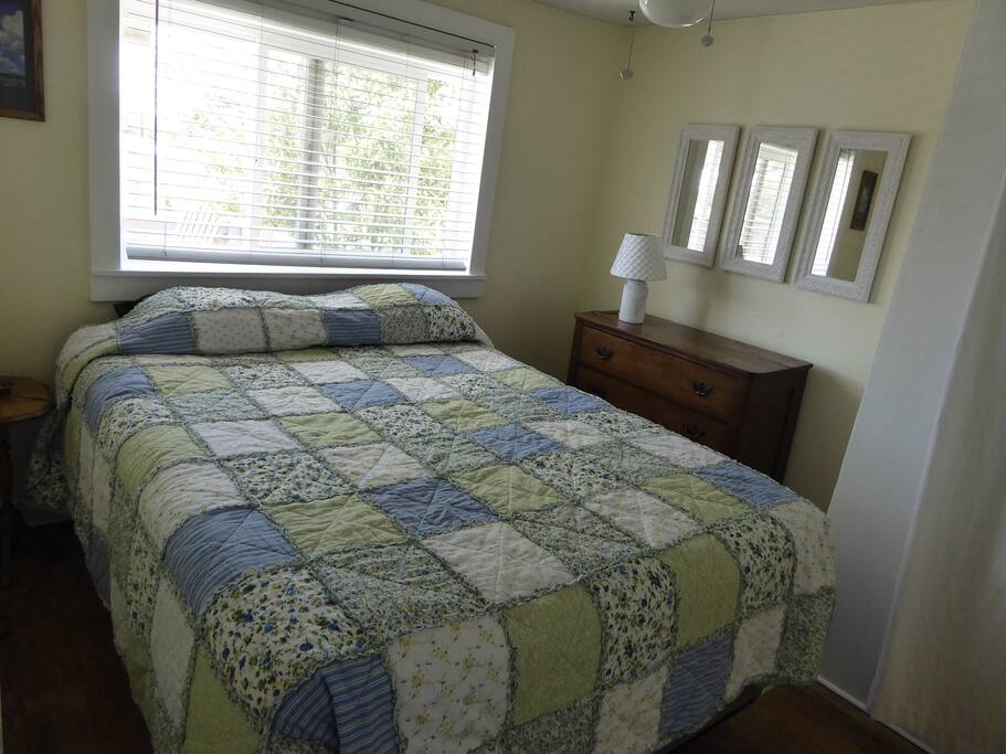 Queen bed in cozy bedroom