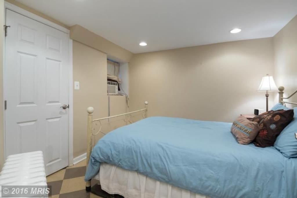 Bedroom with queen size bed.