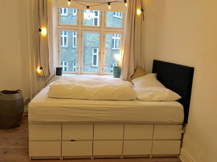 Bedroom with high bed