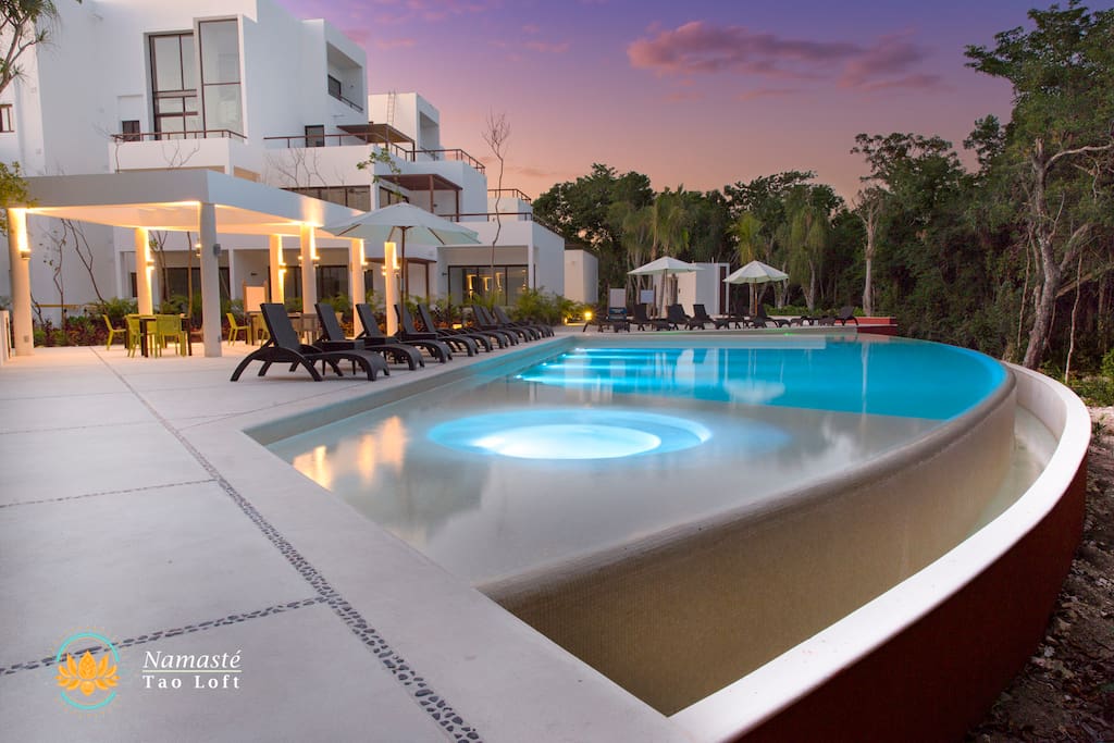Swimming pool with jacuzzi for adults only.