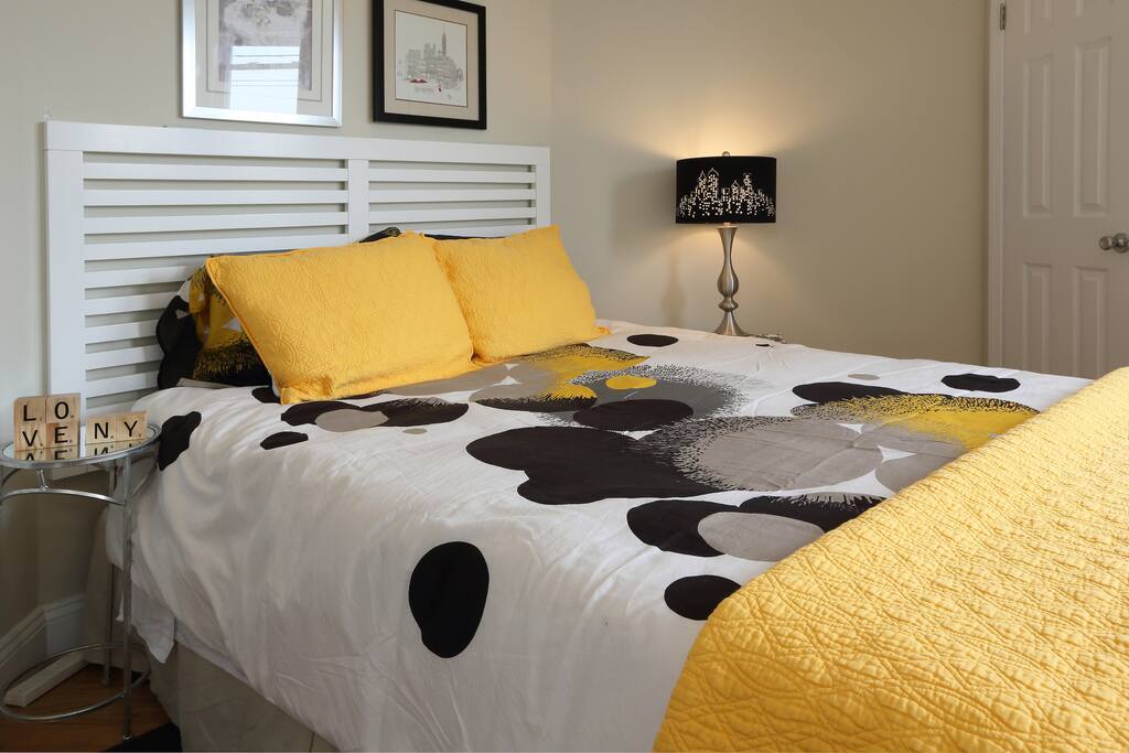 Queen bed, large closet, sitting chair.