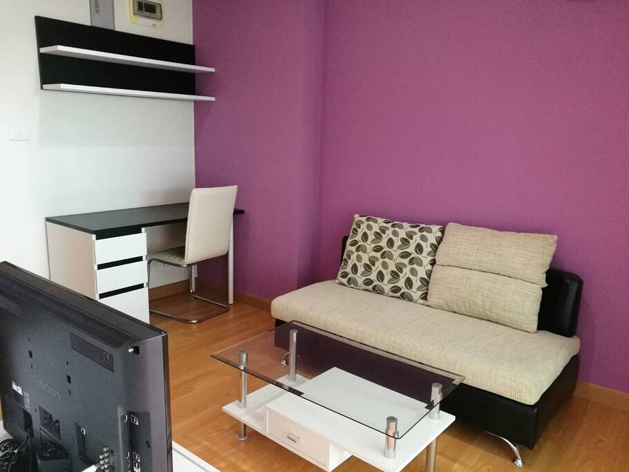 Living room with TV and working space