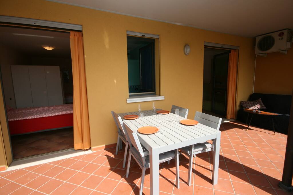 Both living room and bedroom has double glass doors leading to balcony and garden