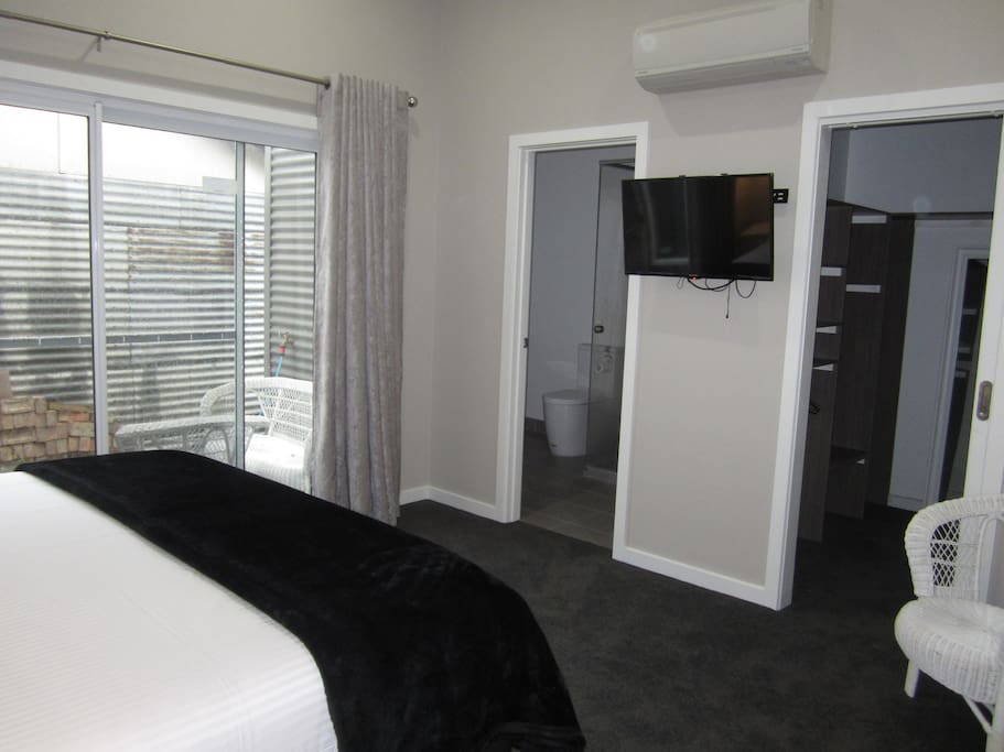 Master bedroom has air-con, TV with DVD player, ensuite and Walk in Robe