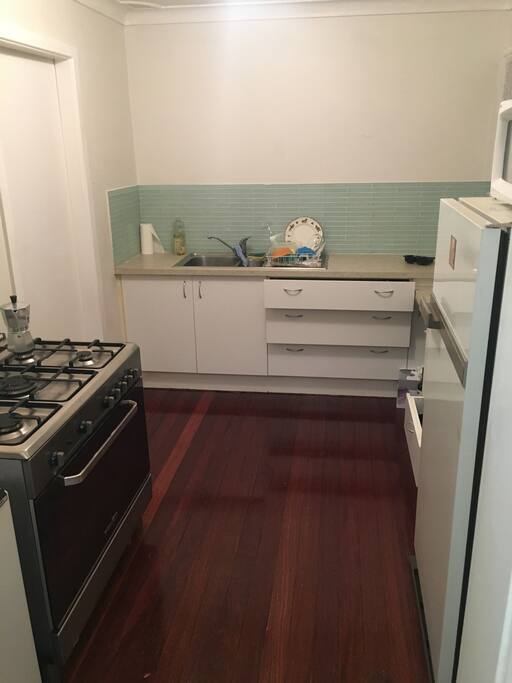 Neat and tidy kitchen with large gas stove