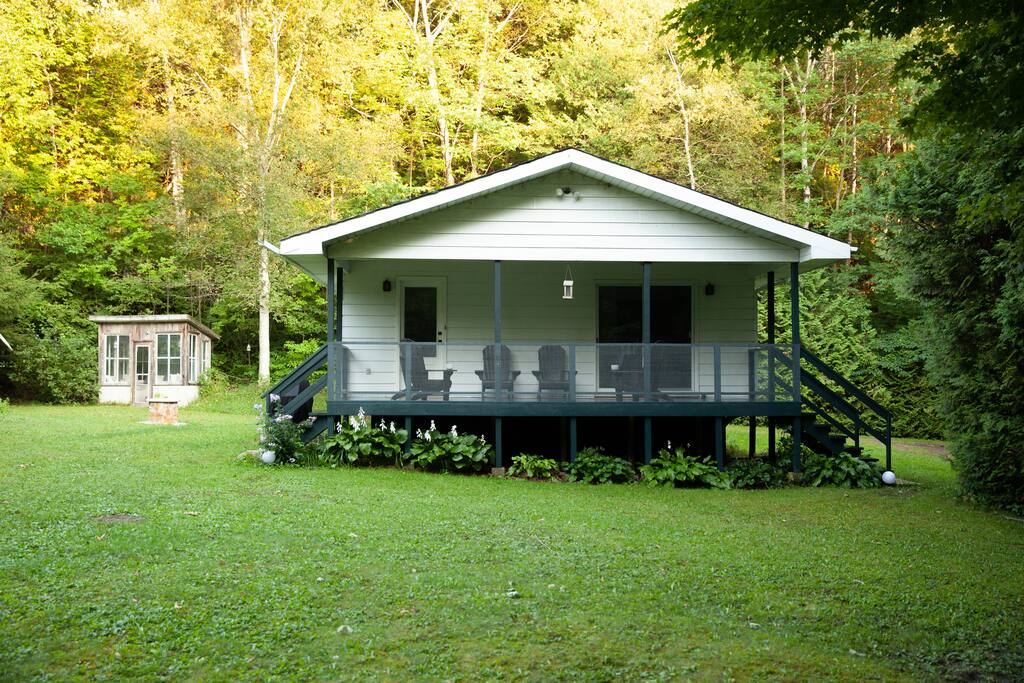 Idylwild from the side. Enjoy a well- shaded porch all day long!
