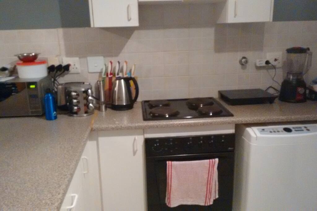 The kitchen with appliances