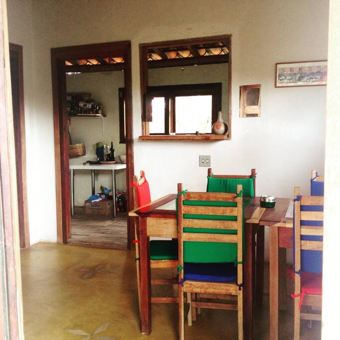 sala de jantar com cozinha americana