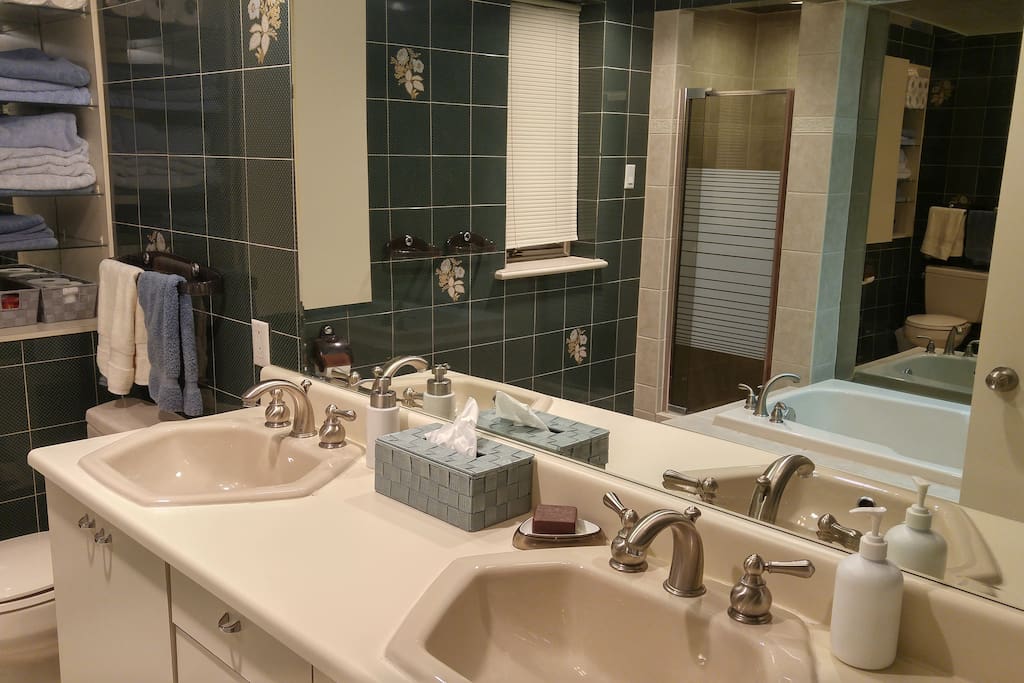 Your large luxurious bathroom with double sinks.