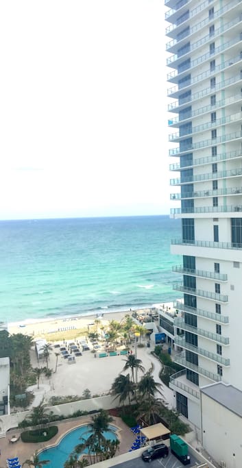 Sandy beach & pool view from balcony! (Also shown newly constructed Hyde Beach Hotel) Guests have direct beach access from the Sian pool for some fun in the sun!