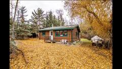 A+real+log+cabin+on+the+lake%21